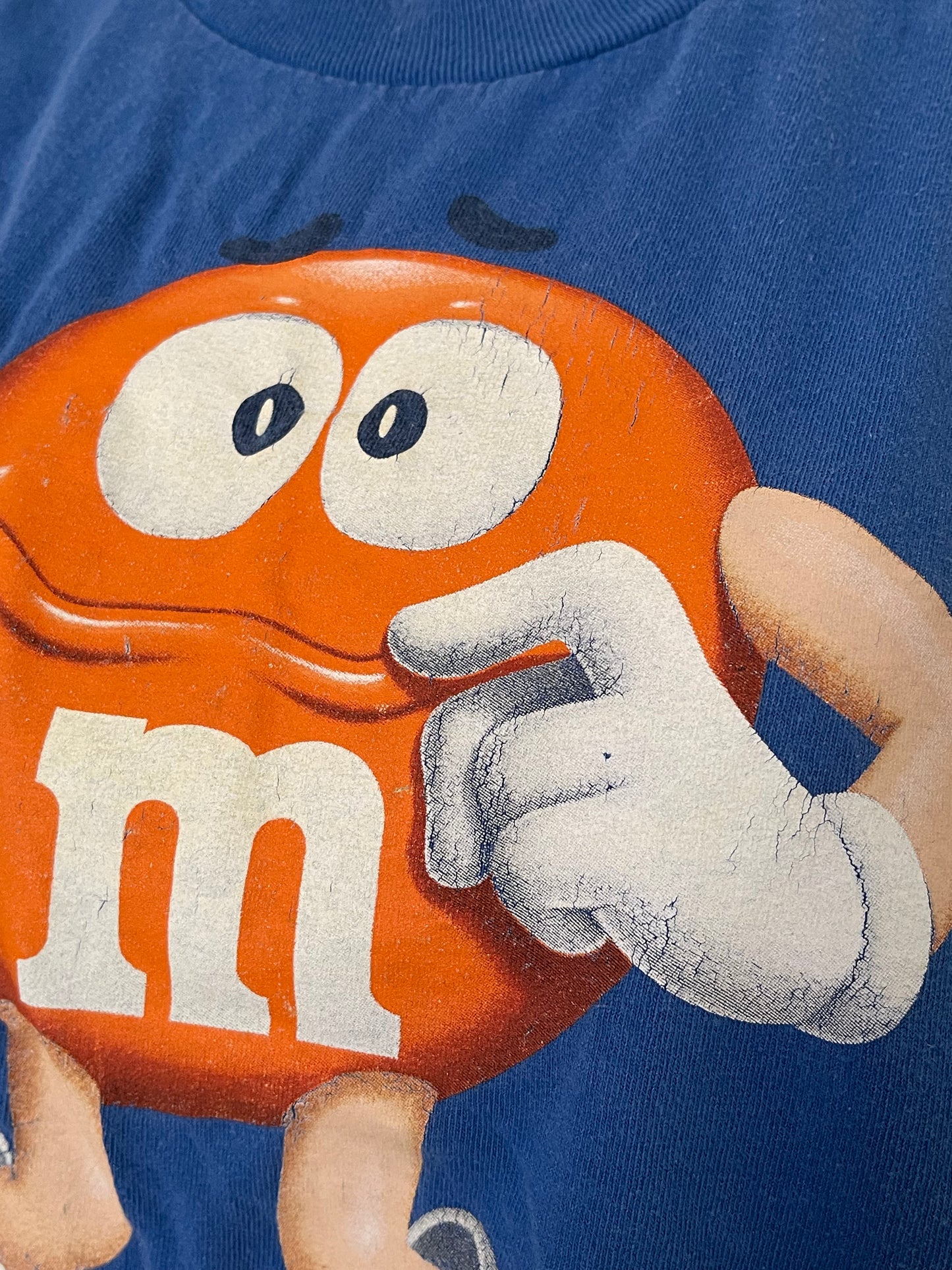 Orange M&M blue tee sz XL