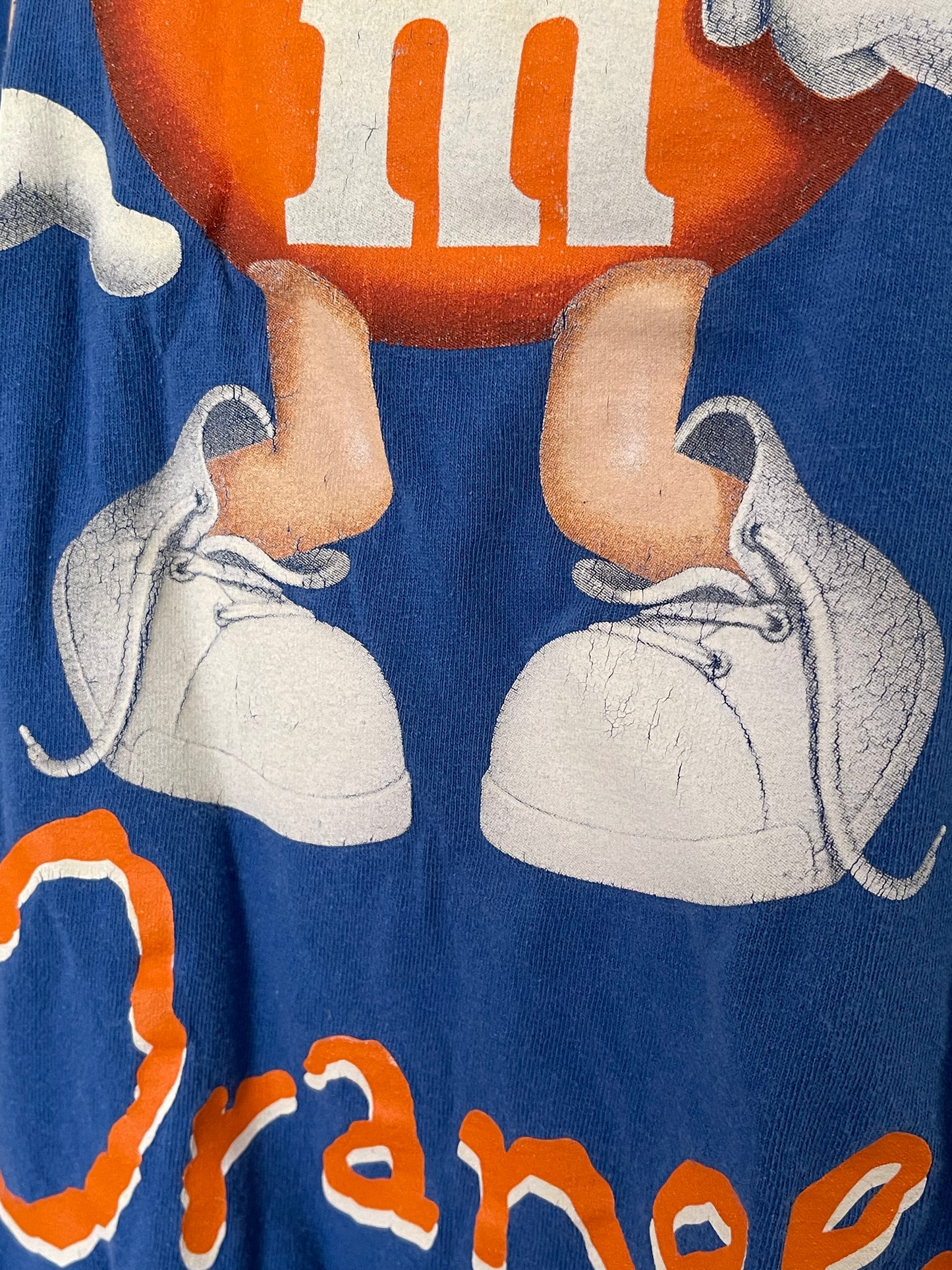 Orange M&M blue tee sz XL