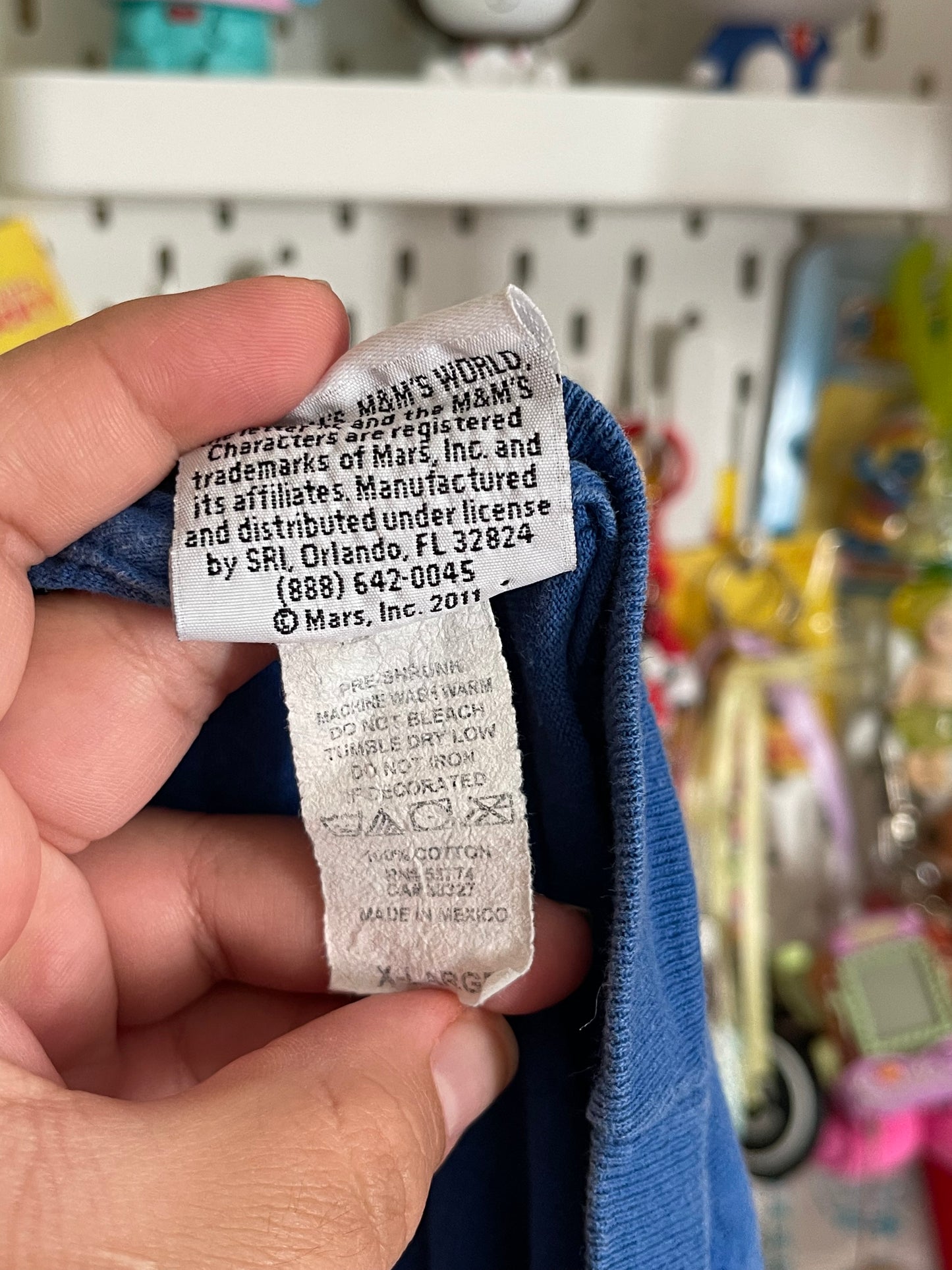 Orange M&M blue tee sz XL