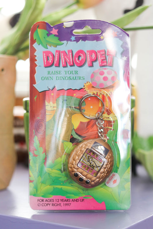 Vintage Deadstock 90s Gold DinoPet Tamagotchi Keychain